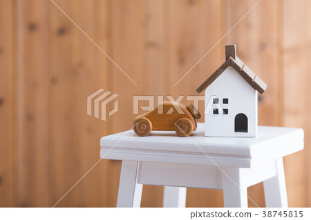 Model of a house placed on a stool Model of a house placed on a stool 38745815