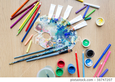 color palette, brushes and paint tubes on table color palette, brushes and paint tubes on table 38747207