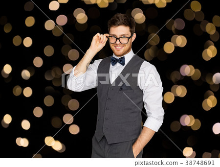 happy man in festive suit and eyeglasses happy man in festive suit and eyeglasses 38748691