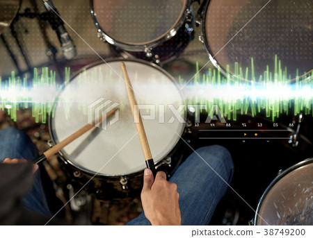 male musician playing drum kit at concert male musician playing drum kit at concert 38749200