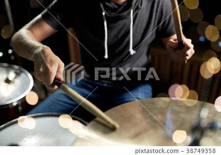 male musician playing drum kit at concert male musician playing drum kit at concert 38749358