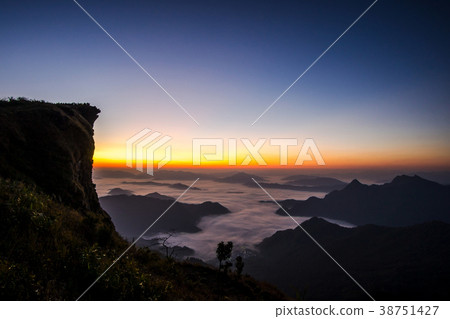 Sunrise scene with the peak of mountain Sunrise scene with the peak of mountain 38751427