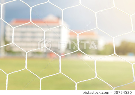 Detail of football net with sunlight in the field 38754520