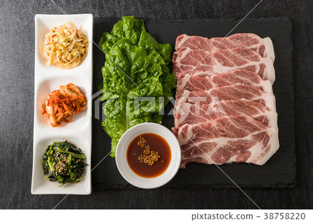 Samgypsal Korean BBQ Barbecue of Korean pork (samgyeopsal) Samgypsal Korean BBQ Barbecue of Korean pork (samgyeopsal) 38758220
