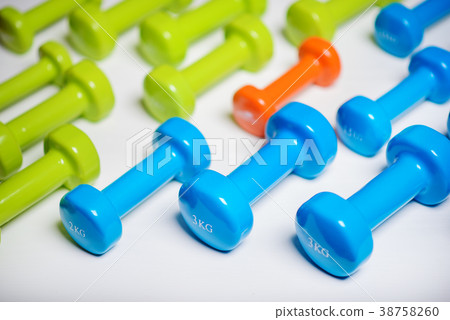 many blue green and one orange in the middle  38758260