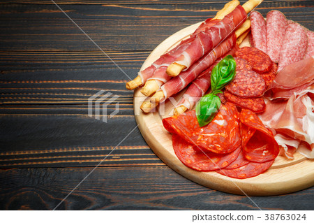 Cold smoked meat plate with pork chops, prosciutto Cold smoked meat plate with pork chops, prosciutto 38763024
