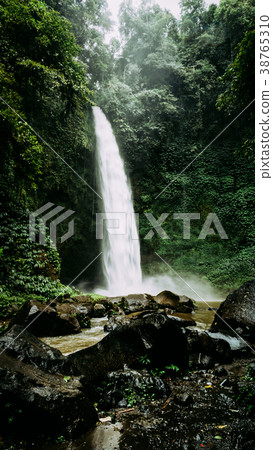 Nungnung waterfall on rainy day. Bali, Indonesia 38765310