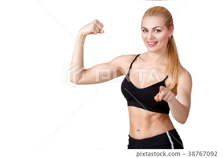 girl in sportswear does exercises and looks at girl in sportswear does exercises and looks at 38767092