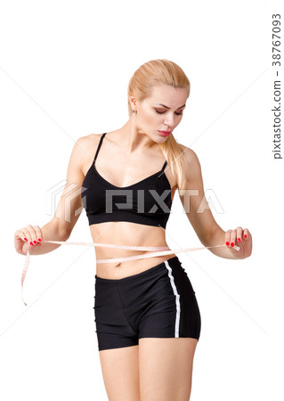 fitness girl measures her waist with measuring fitness girl measures her waist with measuring 38767093