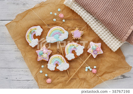 Colorful cookies on white wooden background Colorful cookies on white wooden background 38767198