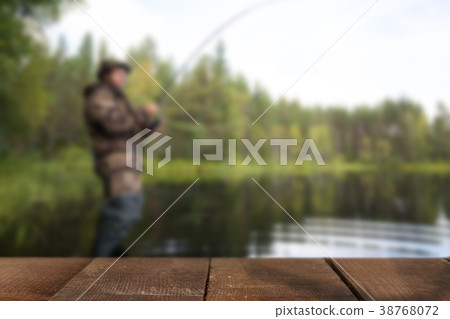 Young man fishing 38768072