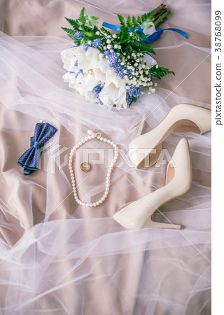 Bride's bouquet of white tulips and blue flowers 38768099