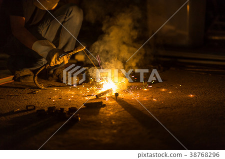 Welder Industrial automotive part in factory. 38768296