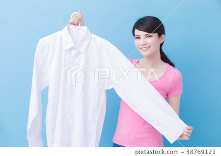 housewife take clean shirt 38769121