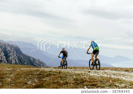 two cyclists mountainbiker 38769345