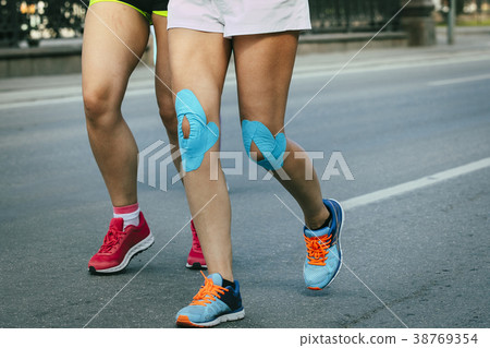 female runner blue kinesio tape female runner blue kinesio tape 38769354