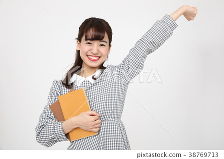 A student doing a guts pose 38769713