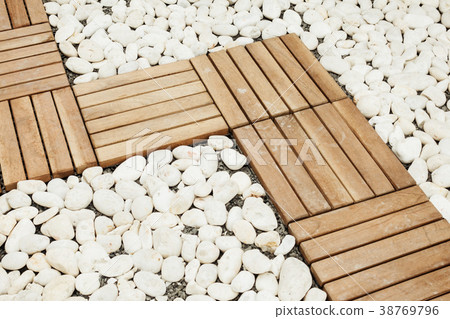 wooden foot pavement withwhite pebble  stone 38769796