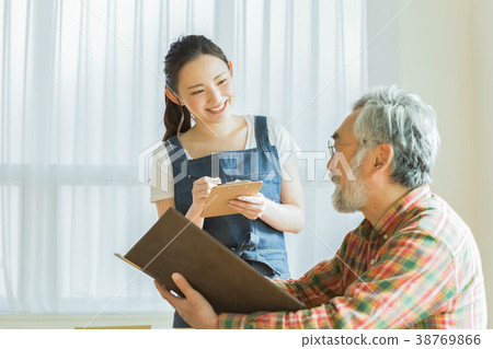 A woman working in a cafe 38769866