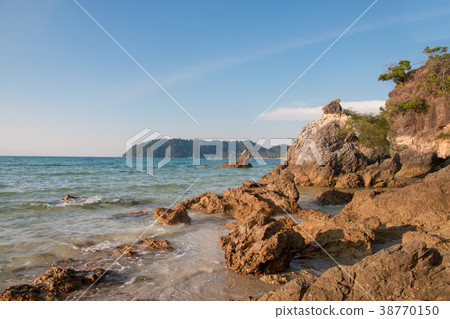 tropical sea and beach with blue sky background tropical sea and beach with blue sky background 38770150