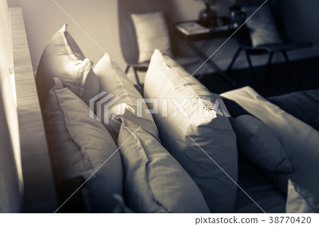 light soft pillow on beautiful bed cozy bedroom light soft pillow on beautiful bed cozy bedroom 38770420
