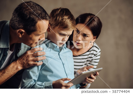 Worried parents struggling with sons game Worried parents struggling with sons game 38774404
