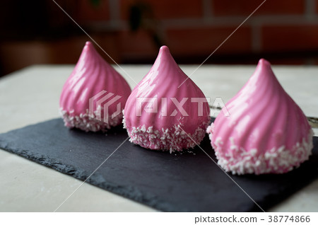 Three beautiful mousse cakes covered with mirror 38774866