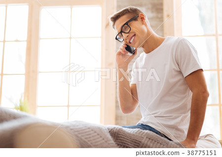 Happy teenager talking on the phone Happy teenager talking on the phone 38775151