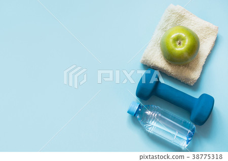 Sport and fitness equipment. Flat lay on blue. 38775318