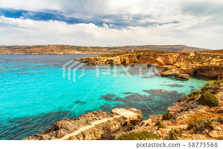 Rocky coast of the Comino island. 38775568