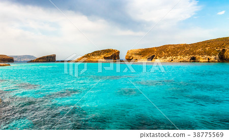 Turquoise lagoon near the Comino island. 38775569