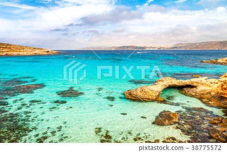 Turquoise lagoon near the Comino island. Turquoise lagoon near the Comino island. 38775572