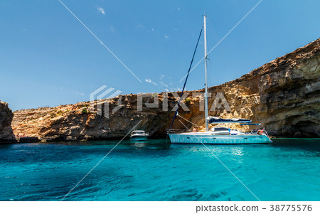 sailing along Comino island sailing along Comino island 38775576