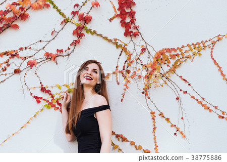 girl walking around her garden, posing  38775886