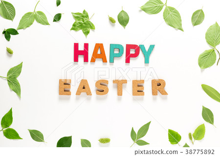 Happy Easter text with green leaves Happy Easter text with green leaves 38775892