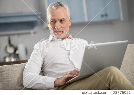 Enigmatical male person creating plan 38776031