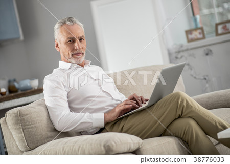Competent businessman working at home 38776033