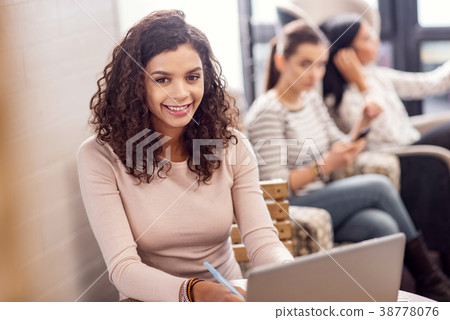 Adorable female freelancer choosing project Adorable female freelancer choosing project 38778076
