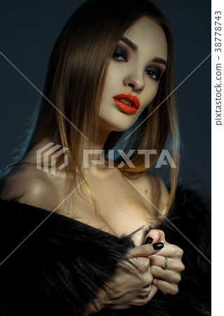young attractive lady with red lips in fur coat young attractive lady with red lips in fur coat 38778743