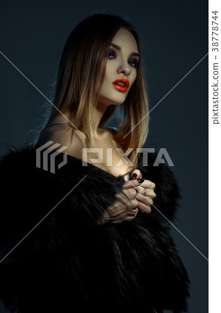 vertical portrait of young attractive lady with vertical portrait of young attractive lady with 38778744