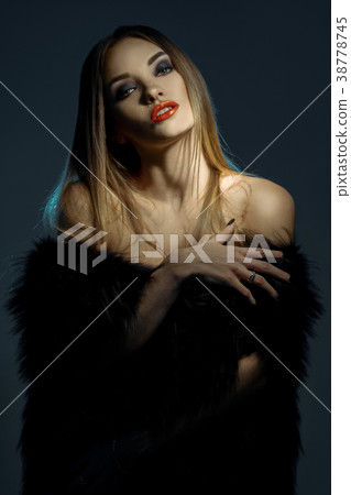 charming high society woman with red lips in fur charming high society woman with red lips in fur 38778745