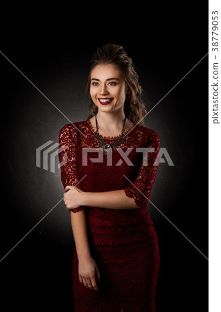 Charming young girl with beautiful curly hairstyle Charming young girl with beautiful curly hairstyle 38779053