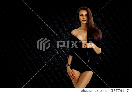 Charming slim woman in black jacket and panties Charming slim woman in black jacket and panties 38779147