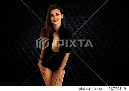 vertical portrait pretty smiling girl in a black vertical portrait pretty smiling girl in a black 38779149