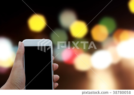 Hand holding phone black clipping inside Hand holding phone black clipping inside 38780058