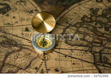 Old compass on vintage map Old compass on vintage map 38782946