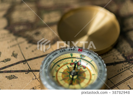 Old compass on vintage map Old compass on vintage map 38782948