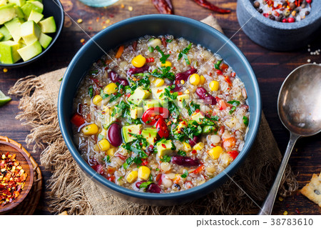 Vegetable quinoa soup, avocado, corn, beans. Vegetable quinoa soup, avocado, corn, beans. 38783610
