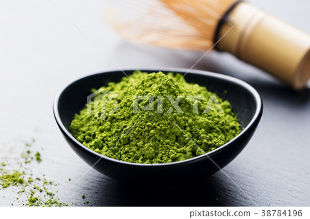 Matcha, green tea powder in bowl with bamboo whisk 38784196