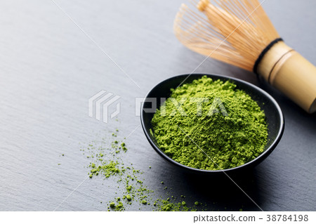 Matcha, green tea powder in bowl with bamboo whisk 38784198